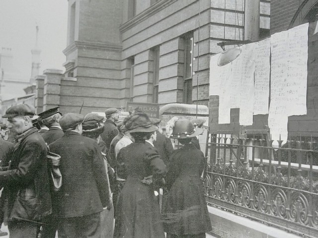 68- Titanic crowds outside White Star Line